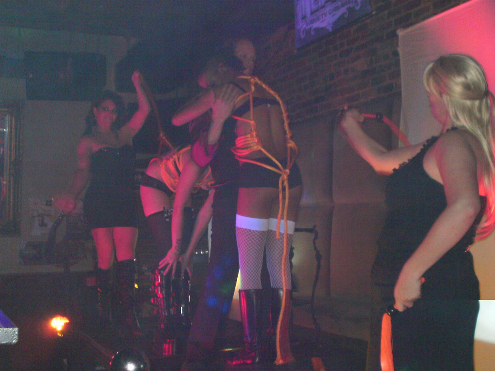 Nightclub performers in rope-bondage act
